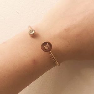 A rose gold Scorpio bracelet